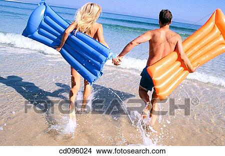 Picture - affection, amusement, air-bed, air mattress, activity. Fotosearch