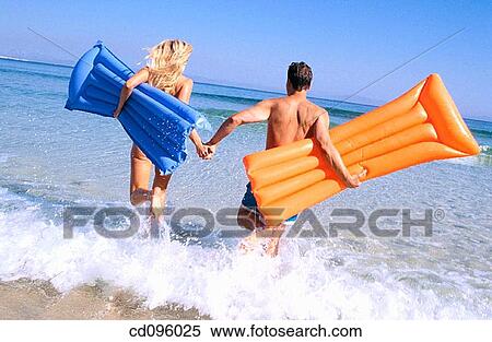 Stock Photography - affection, amusement, air-bed, air mattress, activity. Fotosearch