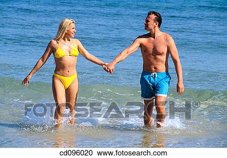 affection, beach, bathing-suit, activity View Large Photo Image Stock Image - affection, beach, bathing-suit, activity. Fotosearch
