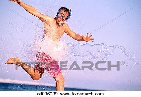 air, beach, bathing-suit, amusement, activity View Large Photo Image Stock Photo - air, beach, bathing-suit, amusement, activity. Fotosearch