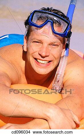 Picture - air-bed, bathing-suit, amusement, air mattress. Fotosearch