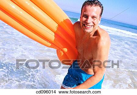 air-bed, beach, bathing-suit, amusement, air mattress View Large Photo Image Picture - air-bed, beach, bathing-suit, amusement, air mattress. Fotosearch