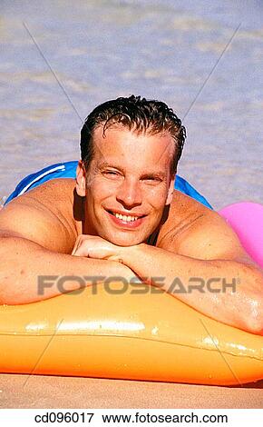 air-bed, carefree, beach, bathing-suit, air mattress View Large Photo Image Stock Photo - air-bed, carefree, beach, bathing-suit, air mattress. Fotosearch