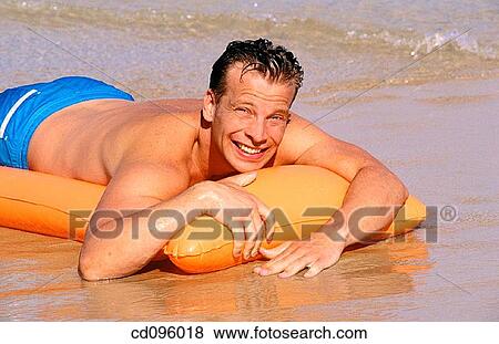 air-bed, carefree, beach, bathing-suit, air mattress View Large Photo Image Stock Photo - air-bed, carefree, beach, bathing-suit, air mattress. Fotosearch