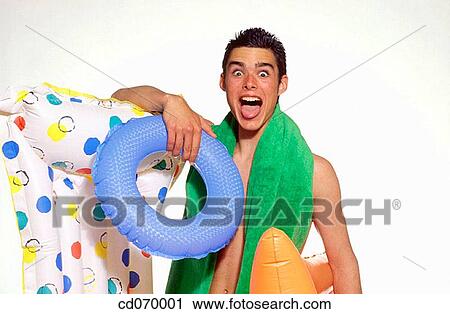 Stock Image - air mattress, amusing, amusement, air-bed, adolescence. Fotosearch