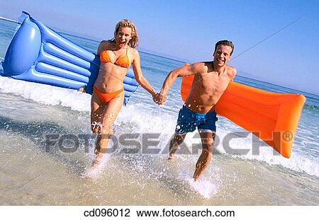 air mattress, bathing-suit, amusement, air-bed, activity View Large Photo Image Stock Image - air mattress, bathing-suit, amusement, air-bed, activity. Fotosearch