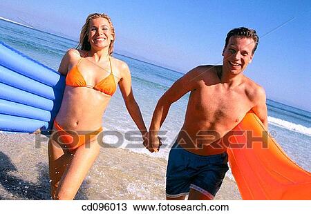 air mattress, bathing-suit, amusement, air-bed, activity View Large Photo Image Stock Image - air mattress, bathing-suit, amusement, air-bed, activity. Fotosearch