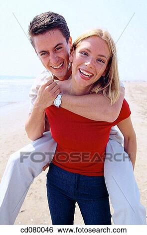 amusement, black hair, Best friend, beach, activity View Large Photo Image Stock Photograph - amusement, black hair, Best friend, beach, activity. Fotosearch