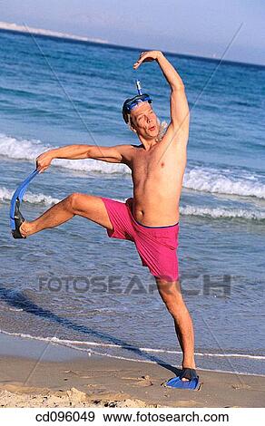 amusing, carefree, beach, bathing-suit, amusement View Large Photo Image Stock Photo - amusing, carefree, beach, bathing-suit, amusement. Fotosearch