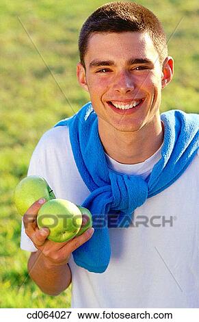 apple, carefree, boy, black hair, adolescence View Large Photo Image Stock Photo - apple, carefree, boy, black hair, adolescence. Fotosearch