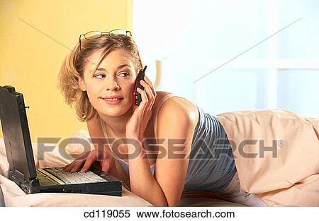 askance, blond, bedroom, at-home, activity View Large Photo Image Stock Photography - askance, blond, bedroom, at-home, activity. Fotosearch