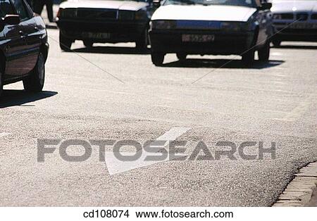 asphalt, city, car, automobile, arrow View Large Photo Image Picture - asphalt, city, car, automobile, arrow. Fotosearch