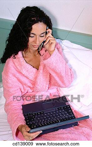 at-home, bedroom, bed, bathrobe, absorbed View Large Photo Image Stock Photo - at-home, bedroom, bed, bathrobe, absorbed. Fotosearch