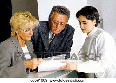 Stock Photo - attention, baby boomer, attentive, Admission desk. Fotosearch