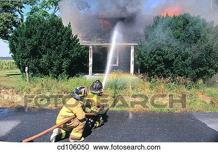 Stock Image - back view, burning, catastrophe, country, crouch. Fotosearch
