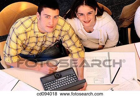 Stock Photo - Ball-point pen, brunette, boy, Best friend, adolescence. Fotosearch
