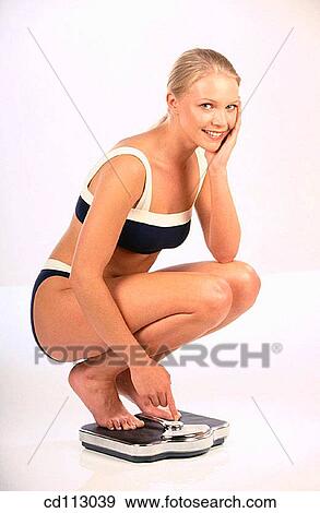 barefoot, Beauty Care, beauty, Bathroom scale, activity View Large Photo Image Stock Photo - barefoot, Beauty Care, beauty, Bathroom scale, activity. Fotosearch