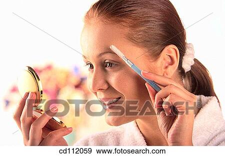 bathrobe, brush, Body care, blond, activity View Large Photo Image Stock Photo - bathrobe, brush, Body care, blond, activity. Fotosearch