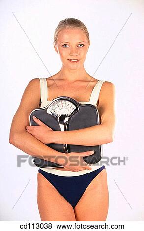 Bathroom scale, beauty, Beauty Care, blond View Large Photo Image Stock Photo - Bathroom scale, beauty, Beauty Care, blond. Fotosearch