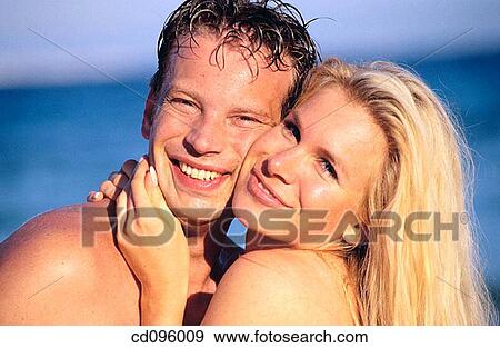 beach, caressing, caress, blond, affection View Large Photo Image Stock Photo - beach, caressing, caress, blond, affection. Fotosearch