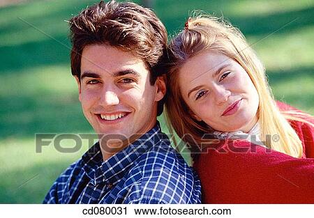 Best friend, black hair, blond, calm, carefree View Large Photo Image Stock Image - Best friend, black hair, blond, calm, carefree. Fotosearch