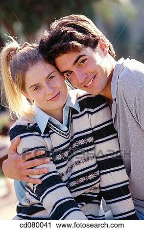 Stock Image - Best friend, bonding, bond, black hair, affection. Fotosearch