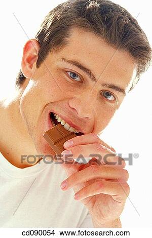 bite, biting, black hair, calorie View Large Photo Image Picture - bite, biting, black hair, calorie. Fotosearch