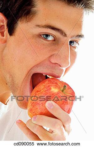 bite, black hair, biting, apple View Large Photo Image Stock Photography - bite, black hair, biting, apple. Fotosearch