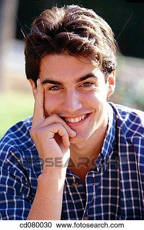 Stock Image - black hair, carefree, Close-up. Fotosearch