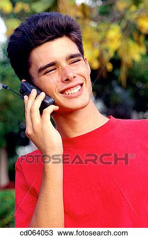black hair, cell phone, carefree, boy, adolescence View Large Photo Image Stock Image - black hair, cell phone, carefree, boy, adolescence. Fotosearch