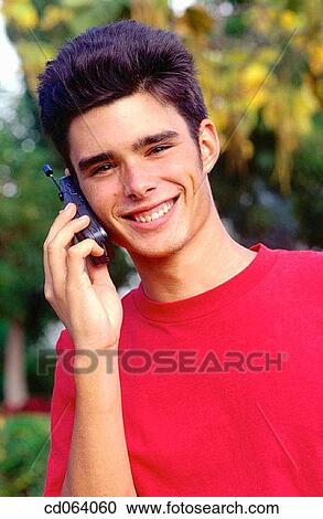 black hair, cell phone, carefree, boy, adolescence View Large Photo Image Stock Image - black hair, cell phone, carefree, boy, adolescence. Fotosearch