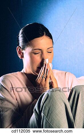 Blow nose, brunette, Blowing nose, activity View Large Photo Image Stock Photography - Blow nose, brunette, Blowing nose, activity. Fotosearch