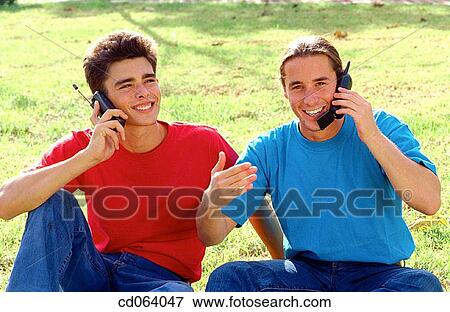 boy, cell phone, carefree, adolescence View Large Photo Image Stock Photo - boy, cell phone, carefree, adolescence. Fotosearch