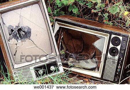 Broken televisions dumped in field View Large Photo Image Stock Photo - Broken televisions dumped in field. Fotosearch