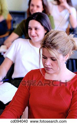 brunette, adolescence, blond, attentive, attention, activity View Large Photo Image Stock Image - brunette, adolescence, blond, attentive, attention, activity. Fotosearch