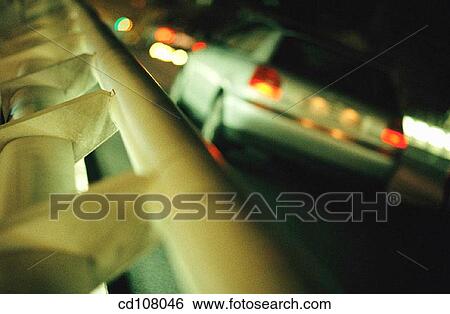 Stock Photograph - car, illuminate, fence, automobile. Fotosearch