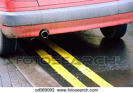 Stock Image - Car parked on double yellow lines. Fotosearch