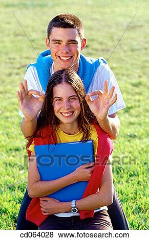 Stock Photo - carefree, Best friend, brunette, boy, black hair, adolescence. Fotosearch