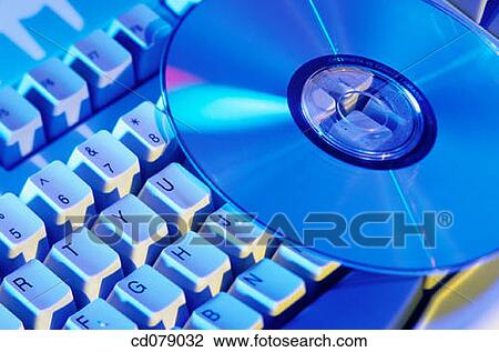 Stock Image - CD and keyboard. Fotosearch