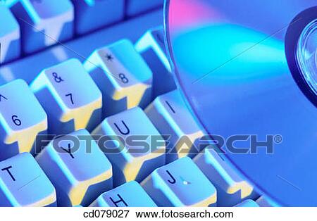 CD and keyboard View Large Photo Image Stock Photo - CD and keyboard. Fotosearch