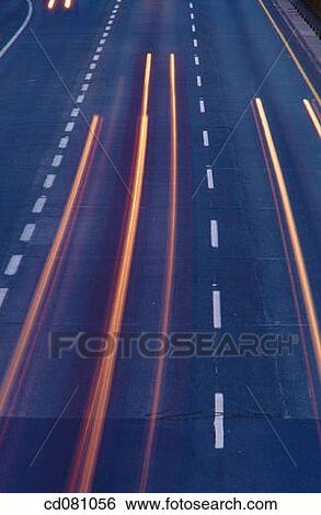 Stock Photograph - detail, highway, fast, dusk, asphalt. Fotosearch