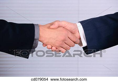 Picture - Hand shake. Fotosearch