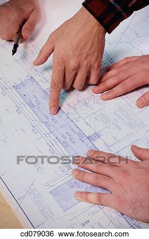 Hands and blueprints View Large Photo Image Stock Photograph - Hands and blueprints. Fotosearch