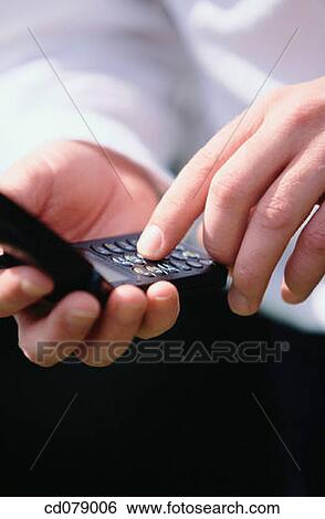 Hands and cell phone View Large Photo Image Stock Photograph - Hands and cell phone. Fotosearch