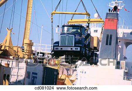 Picture - Loading truck onto ship. Fotosearch