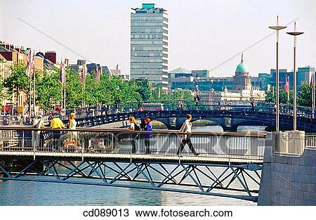 Millennium Bridge over the Liffey River, Ha? penny Bridge behind. Dublin. Ireland View Large Photo Image Stock Image - Millennium Bridge over the Liffey River, Ha? penny Bridge behind. Dublin. Ireland. Fotosearch