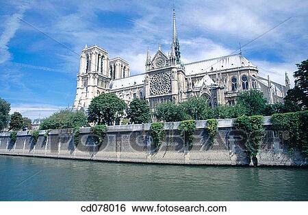 Stock Photograph - Notre Dame cathedral from Seine River (lateral facade). Paris. France.. Fotosearch