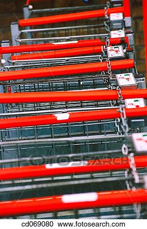 Shopping trolleys at supermarket View Large Photo Image Stock Image - Shopping trolleys at supermarket. Fotosearch