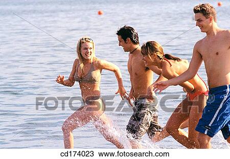 adolescence, bathing-suit, amusement, activity View Large Photo Image Stock Image - adolescence, bathing-suit, amusement, activity. Fotosearch