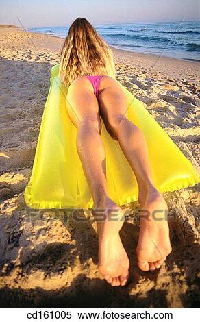 Stock Photography - air-bed, beach, back view, air mattress. Fotosearch